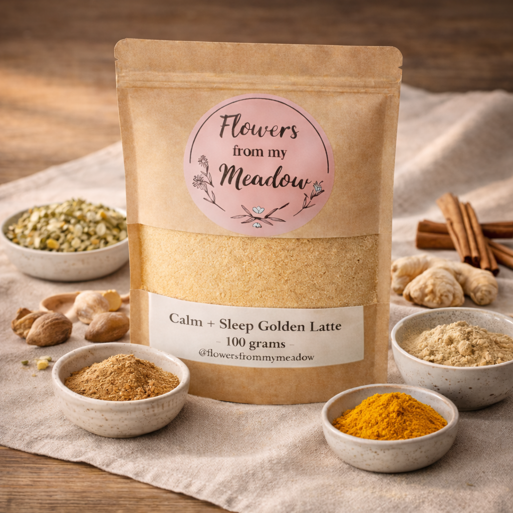 Kraft paper packaging of 'Flowers from my Meadow' Calm + Sleep Golden Latte with ingredients on a wooden surface.