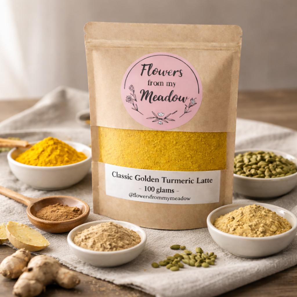 Package of 'Flowers from my Meadow' Classic Golden Turmeric Latte with turmeric and other ingredients on a wooden surface.