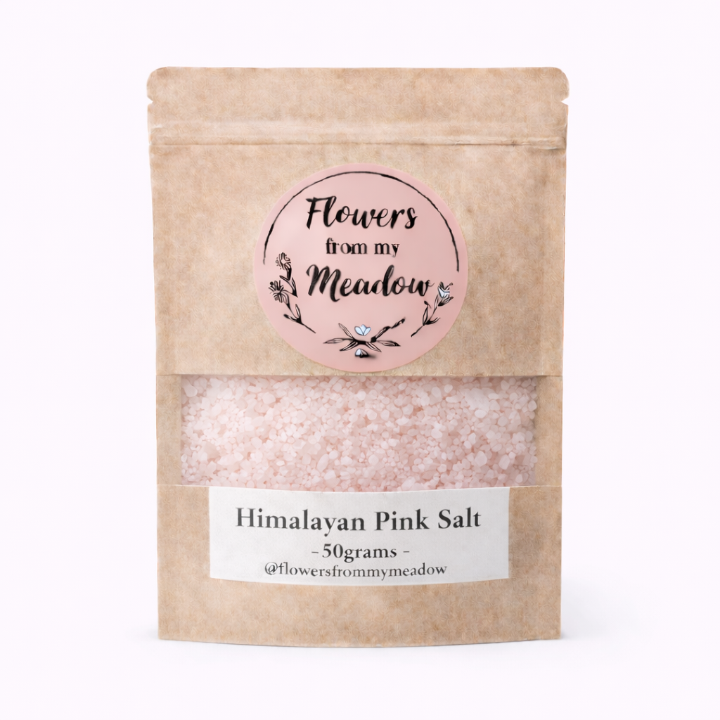 Kraft paper packaging of Himalayan Pink Salt with a decorative label on a white background