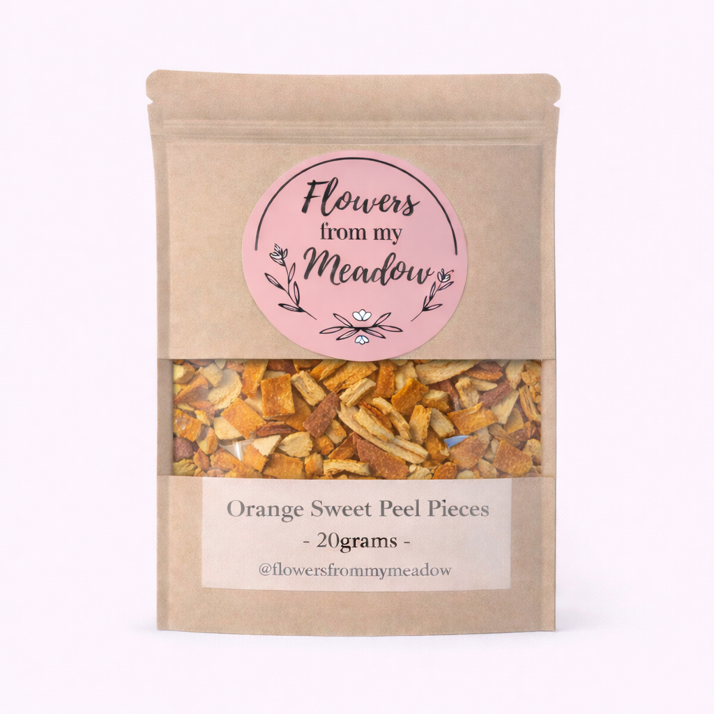 Package of 'Flowers from my Meadow' orange sweet peel pieces on a white background