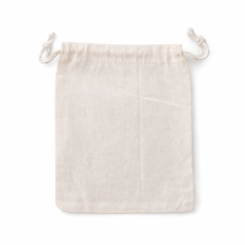 Beige cotton drawstring pouch on a white background