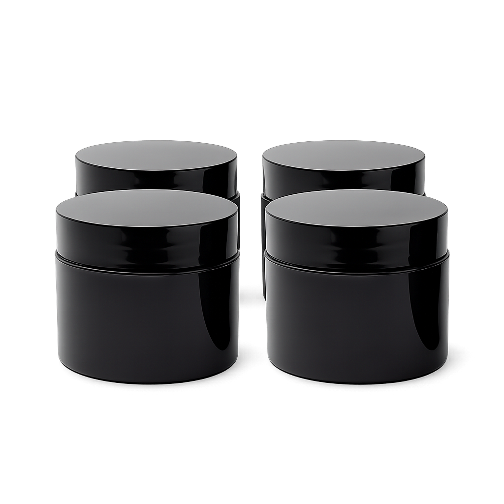 Four black plastic jars with lids on a white background