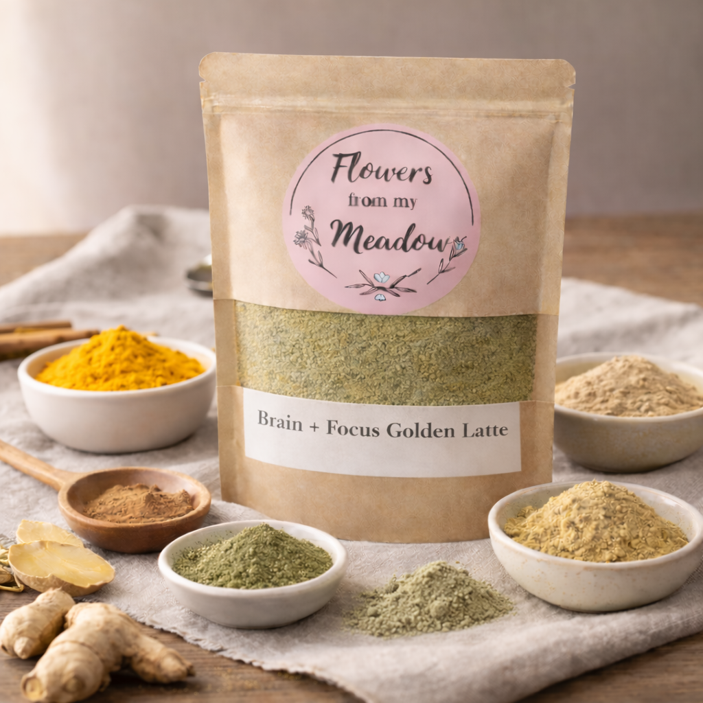 Kraft paper package of 'Flowers from my Meadow' Brain + Focus Golden Latte with ingredients on a wooden surface.