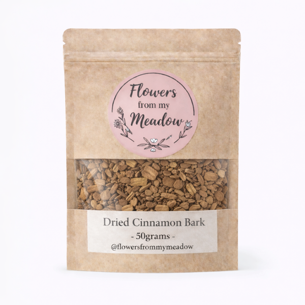 Kraft paper packaging of dried cinnamon bark with a label on a white background