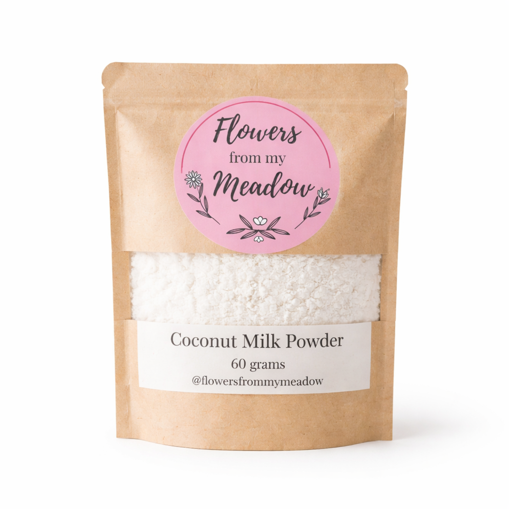 Kraft paper packaging of coconut milk powder with a pink label on a white background