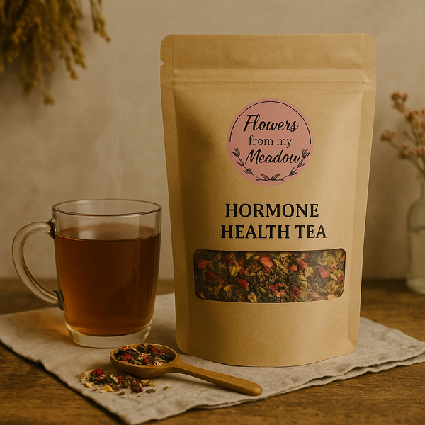 Cup of hormone health tea surrounded by herbs – natural remedy South Africa