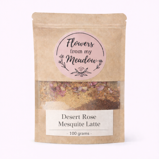 Kraft paper packaging with a label for 'Flowers from my Meadow' desert rose mesquite latte on a white background.