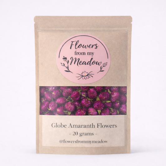 Package of 'Flowers from my Meadow' with pink label and purple flower design on a white background
