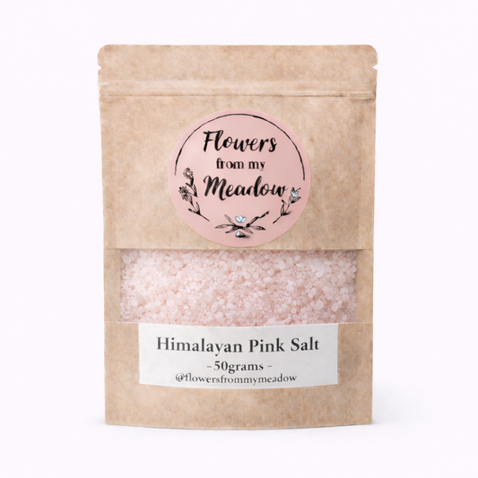 Kraft paper packaging of Himalayan Pink Salt with a decorative label on a white background