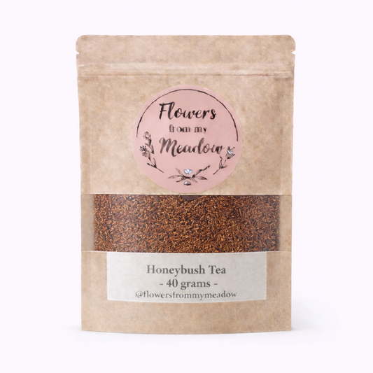 Honeybush tea package with 'Flowers from my Meadow' branding on a white background