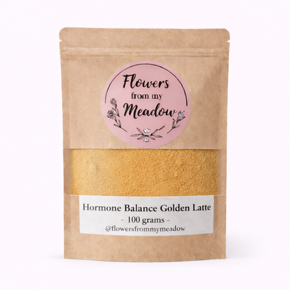 Kraft paper packaging of 'Hormone Balance Golden Latte' with a pink label on a white background