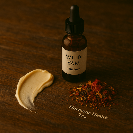 5ml Bottle of Wild Yam Tincture with a dropper on a wooden surface, surrounded by dried herbs and a small amount of cream.