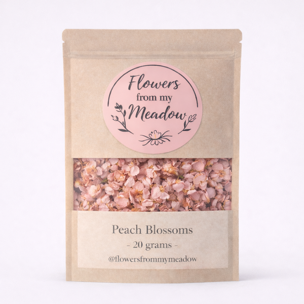 Package of 'Flowers from my Meadow' peach blossoms with a pink label on a white background