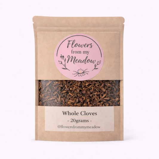 Kraft paper packaging of whole cloves with 'Flowers from my Meadow' label on a white background