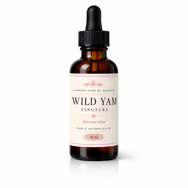An amber glass dropper bottle of Flowers From My Meadow Wild Yam Tincture on a clean white background.