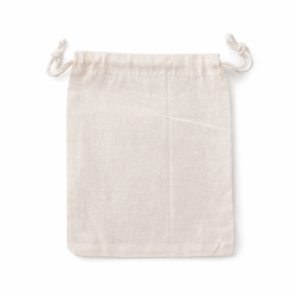 Beige cotton drawstring pouch on a white background