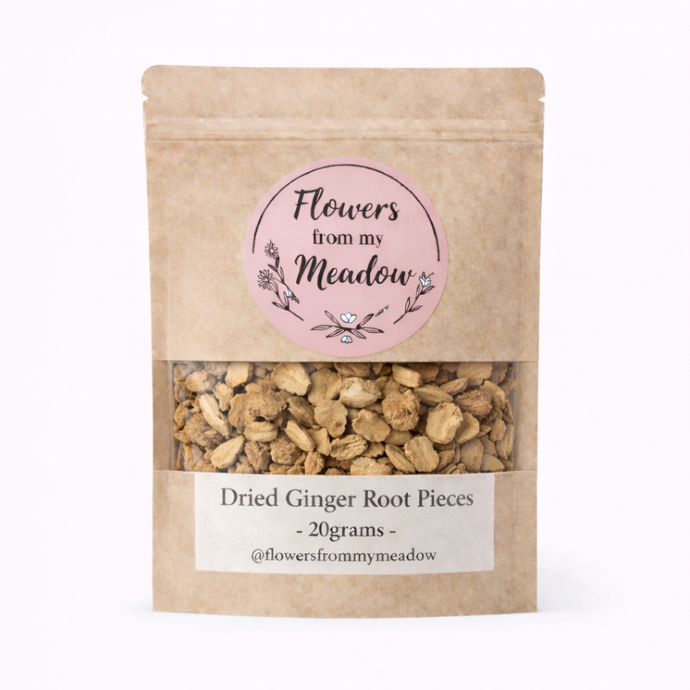 Kraft paper packaging with dried ginger root pieces and a 'Flowers from my Meadow' label on a white background.