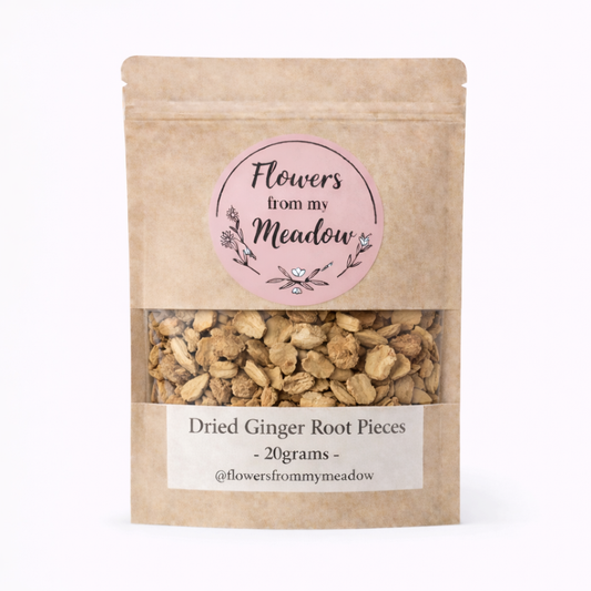 Kraft paper packaging with dried ginger root pieces and a 'Flowers from my Meadow' label on a white background.