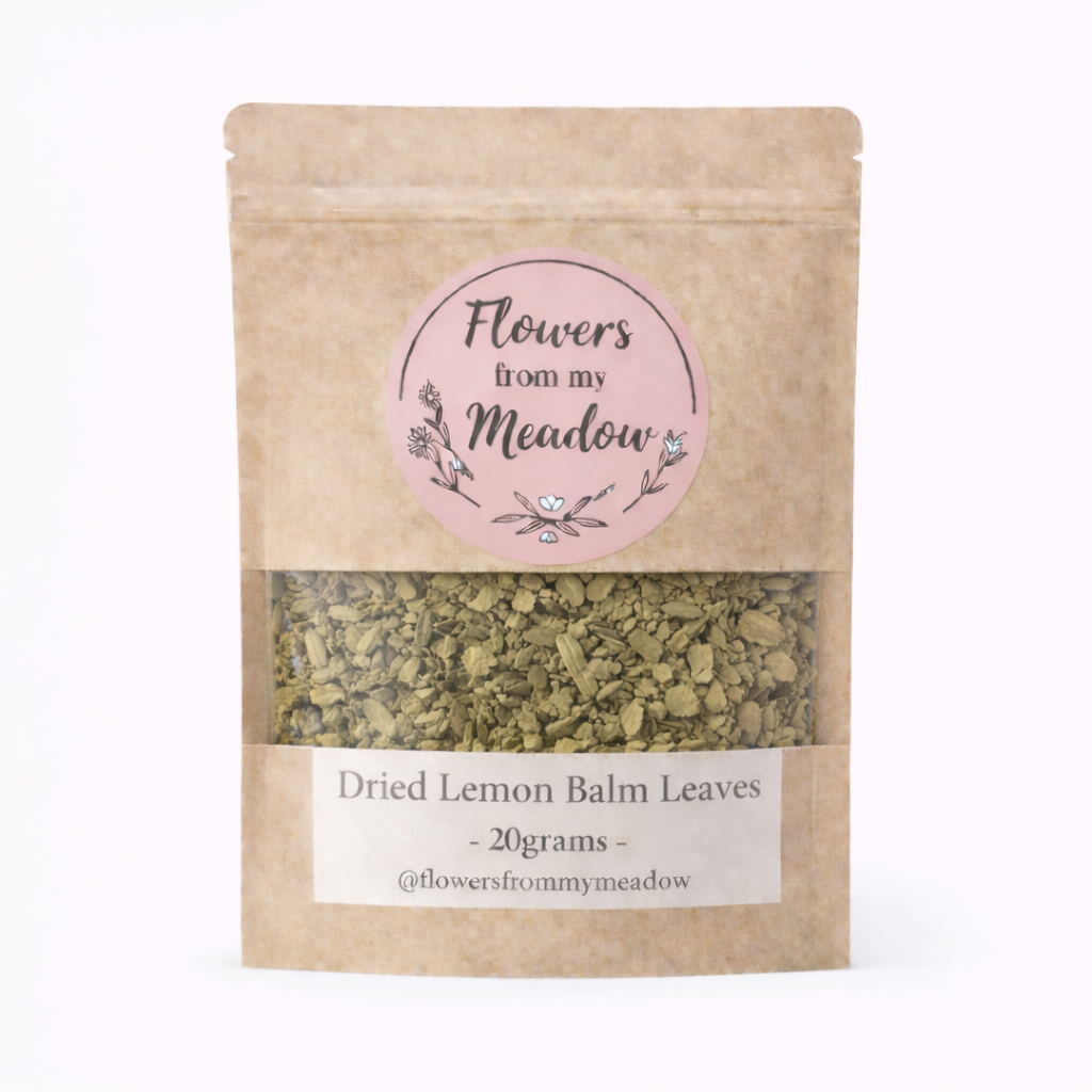 Kraft paper packaging of dried lemon balm leaves with a label on a white background