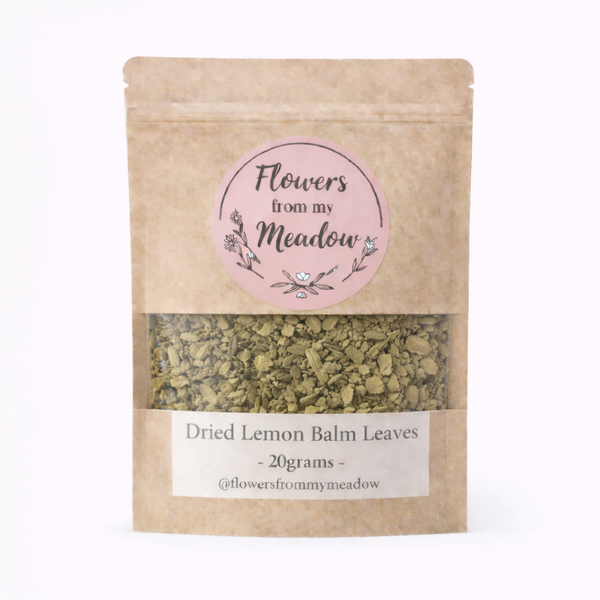 Kraft paper packaging of dried lemon balm leaves with a label on a white background