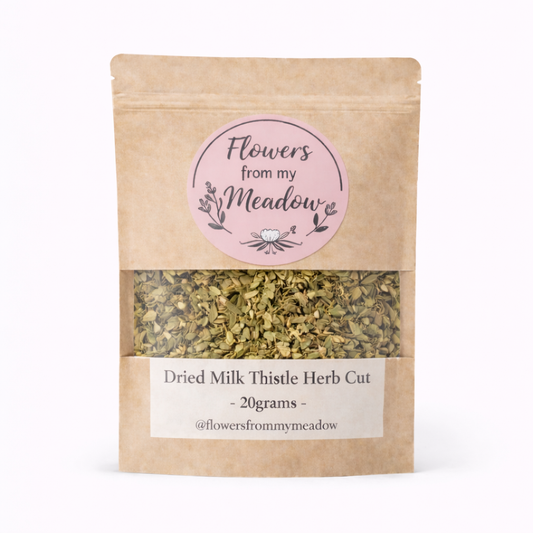 Kraft paper packaging with dried milk thistle herb cut and 'Flowers from my Meadow' label on a white background
