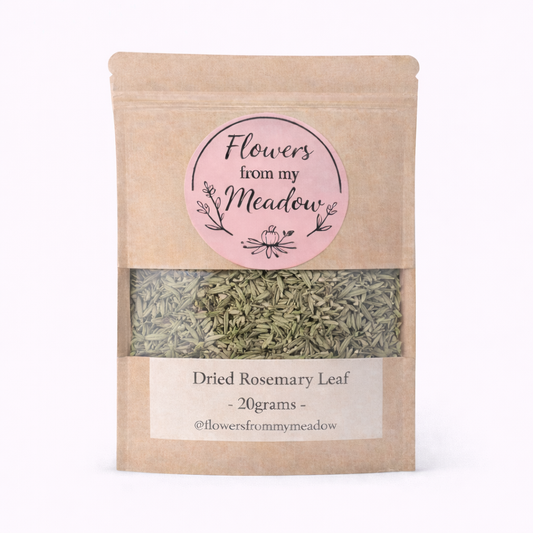 Package of dried rosemary leaves with 'Flowers from my Meadow' label on a white background