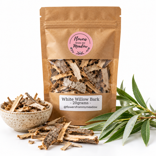 Flowers from my Meadow White Willow Bark 20g in a resealable kraft pouch with the original pink round logo and one white product label, with fibrous grey-brown bark pieces visible through the clear window, dried bark in a ceramic bowl and narrow willow leaves.