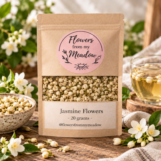 Jasmine Flowers 20 g resealable kraft pouch filled with dried jasmine blossoms, styled with fresh white jasmine flowers and a pale golden infusion