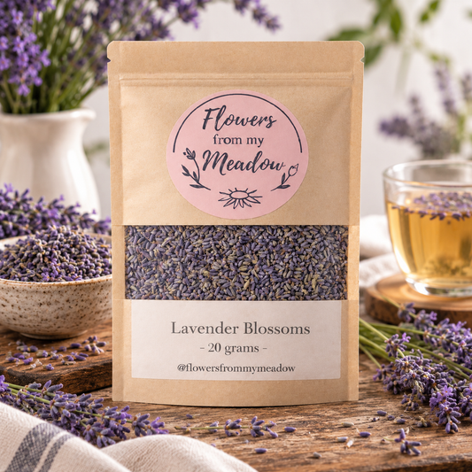 Lavender Blossoms 20 g resealable kraft pouch filled with dried lavender buds, styled with fresh lavender sprigs and a pale golden botanical infusion