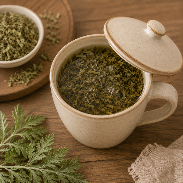 Dried Mugwort Leaf steeping in hot water to prepare a traditional herbal infusion