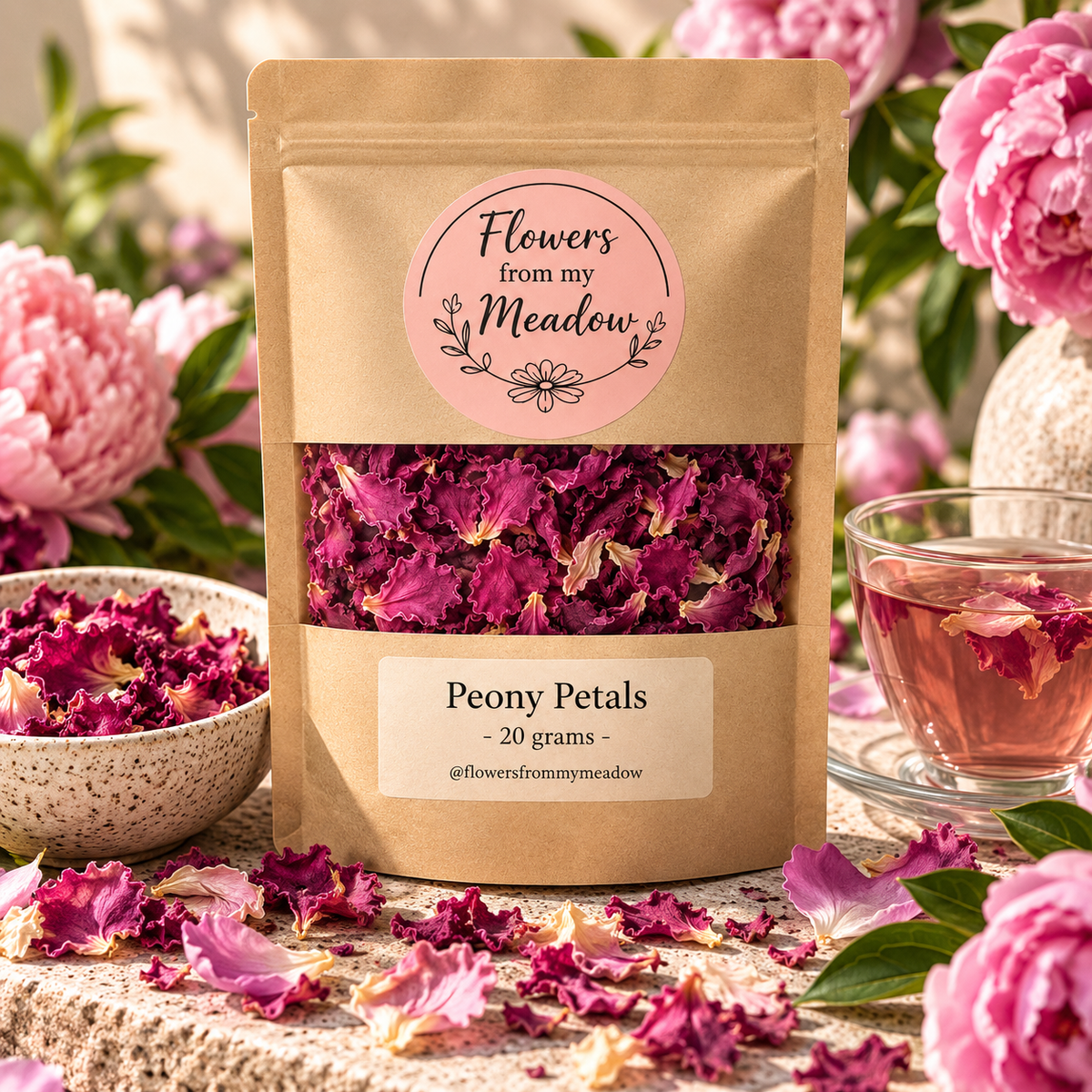 Peony Petals 20 g resealable kraft pouch filled with dried deep pink peony petals, styled with fresh pink peonies and a delicate rosy botanical infusion