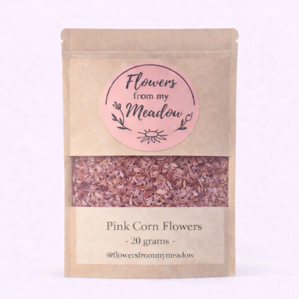 Package of 'Pink Corn Flowers' from 'Flowers from my Meadow' on a light pink background