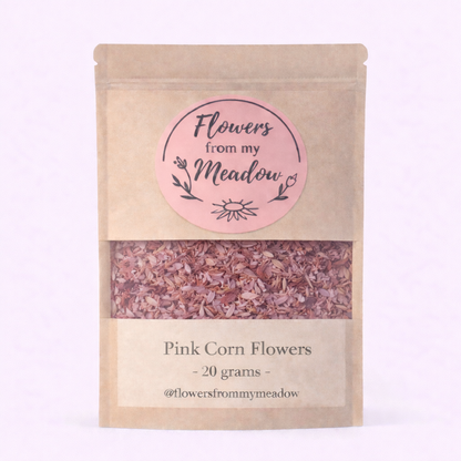 Package of 'Pink Corn Flowers' from 'Flowers from my Meadow' on a light pink background