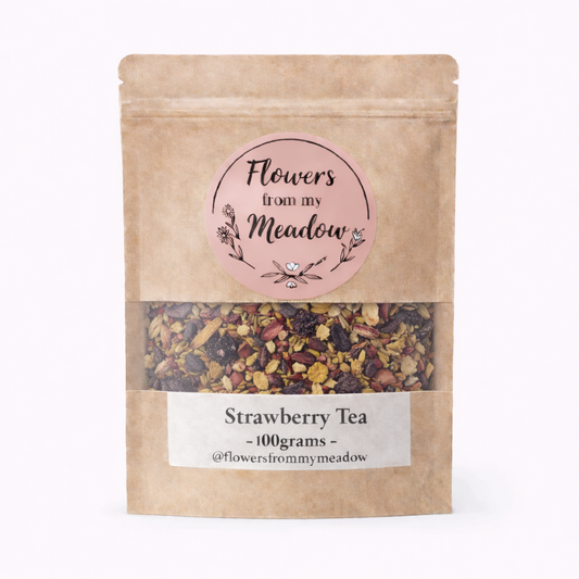 Kraft paper packaging of strawberry tea with a label on a white background
